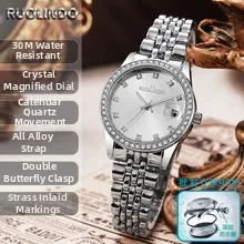 Macro view of elegant silver women's quartz watch featuring rhinestone bezel and alloy band