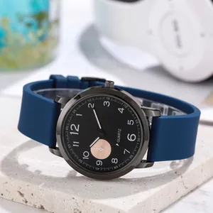 Modern quartz wristwatch with navy blue silicone strap and black dial detail