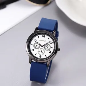 Close-up of modern blue quartz wristwatch with a white multi-function dial design