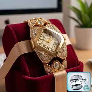 Detailed view of luxury gold women's watch fully encrusted with shimmering crystals