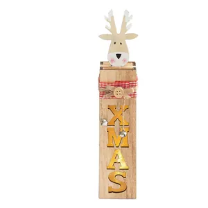Festive wooden Christmas reindeer table ornament with LED lights and golden XMAS text