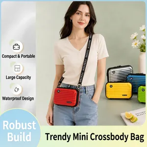 Stylish portable hard-shell mini suitcase crossbody bag for women with wide strap