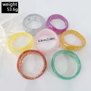 Detail view of colorful glitter resin bangles with 6.8cm inner diameter measurement.