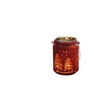 Festive red glass Christmas candle holder with golden tree patterns and LED light
