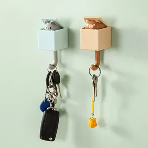 Two creative cartoon animal pop-up wall hooks for hanging keys and small items