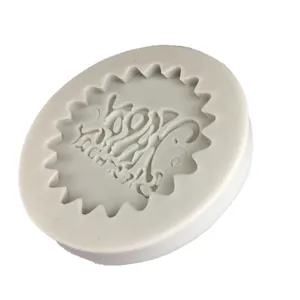 White circular silicone mold with Happy Birthday relief for cake toppers and baking tools