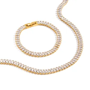 18K gold plated stainless steel baguette zircon necklace and bracelet set on white background