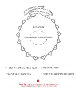 Mesures détaillées et spécifications pour la ceinture en chaîne argentée à cœurs.