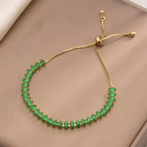 Elegante bracciale dorato regolabile con zirconi verdi taglio marquise stile moderno