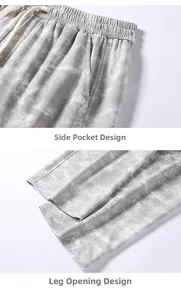 Dettaglio dei pantaloni tie-dye grigi con vita con coulisse elastica e tasche laterali