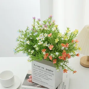 Artificial jasmine and daisy bouquet in white paper bag for home garden decor