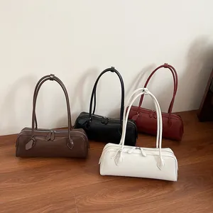 Retro long baguette handbags in brown, black, red and white leather for women
