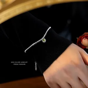 Elegant S925 sterling silver chain necklace featuring a sparkling olive green zircon pendant