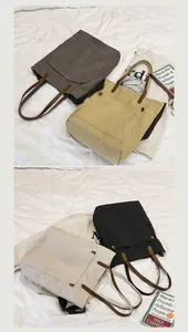 Detailed view of minimalist large canvas tote bags in multiple colors for daily commuting.