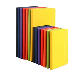Set of colorful A5 leather notebooks with elastic closure bands for office use