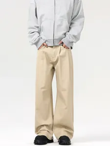 Pantaloni beige a gamba larga in stile vintage con silhouette ampia e tessuto drappeggiato
