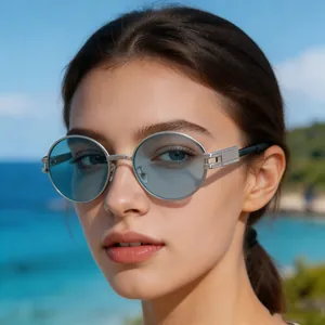 Trendy oval sunglasses with blue lenses for women, stylish outdoor accessory.