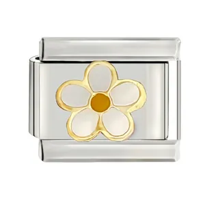Close-up of stainless steel Italian charm with white and gold daisy flower motif