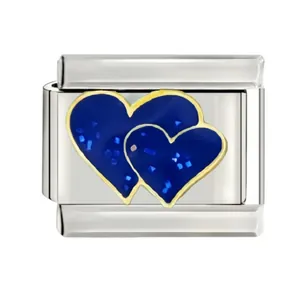 Macro view of stainless steel Italian charm module with double blue glitter hearts