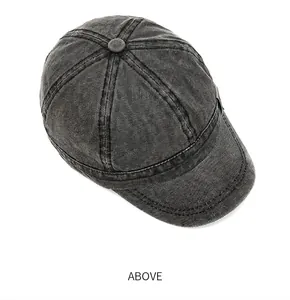 Detailed top view of a washed charcoal canvas baseball cap with a classic short brim
