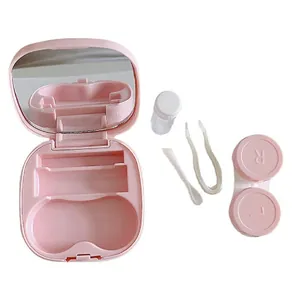 Pink portable contact lens case set with built-in mirror, tweezers, and storage bottle