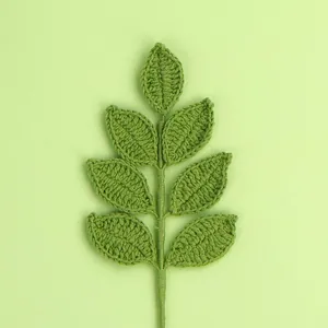 Detailed hand-crocheted green leaf accessory for DIY artificial yarn flower arrangements