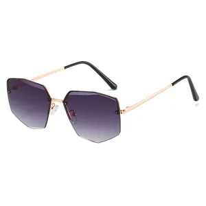 Trendy polygonal rimless sunglasses with purple gradient lenses and gold metal frame