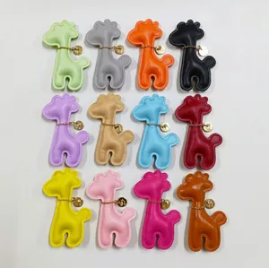 Set of 12 colorful cartoon giraffe leather charms for phone cases and bags