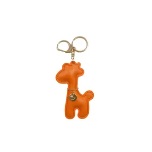 Cute orange cartoon giraffe keychain with lucky girl gold charm for bags and phone cases