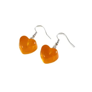 Transparent amber resin heart drop earrings with elegant silver hooks for women.
