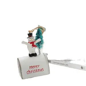 Snowman figurine on white Merry Christmas mailbox hanging ornament for tree decoration