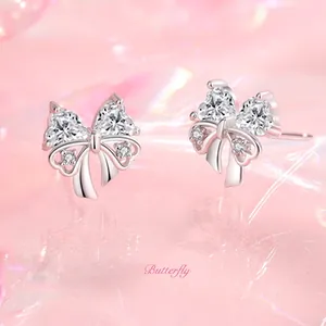 Sparkling silver butterfly heart stud earrings with heart shaped zircon stones for women