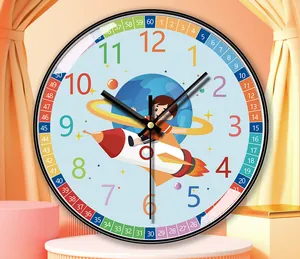 Detailed view of a silent educational wall clock featuring a colorful rocket and boy design