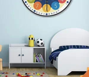 Colorful educational wall clock for children's room in a cozy bedroom scene