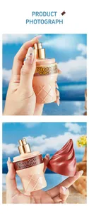 Detailed view of ice cream cone shaped perfume bottle with a golden spray nozzle