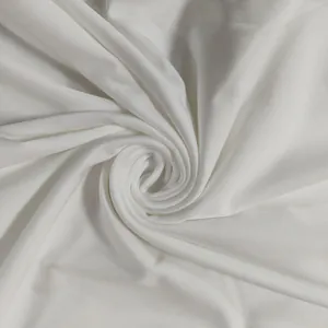 Close-up macro detail of soft white jersey fabric texture for sexy cutout spring dress