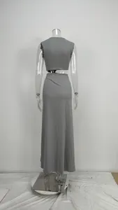 Detailed back view of a sexy grey solid color cutout waist-revealing long maxi dress