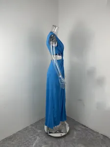 Side profile view of a sexy blue maxi dress with knot cutout detail on a mannequin.