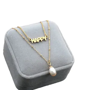 Elegant double-layered gold titanium steel necklace with HAPPY pendant and white pearl