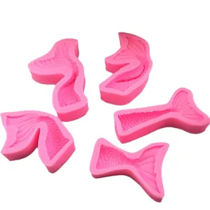 Set of pink mermaid tail silicone molds for ocean-themed cake decorating and fondant
