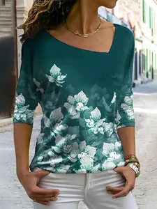 Elegant groen T-shirt met lange mouwen voor dames, bloemenprint en asymmetrische halslijn