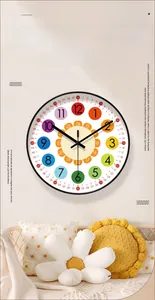 Close-up of a colorful children's wall clock dial with clear educational numbers