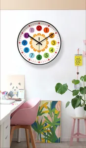 Colorful educational wall clock for kids room shown in a bright and cozy study interior