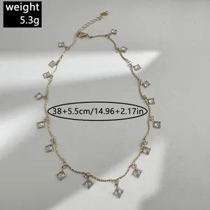Elegant gold necklace featuring square clear stone pendants, weighing 5.3g with dimensions.