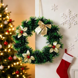 Traditional green tinsel Christmas wreath with gold bows and sparkly flowers for decor