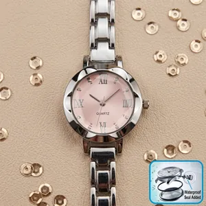 Elegant silver women's quartz watch with pink dial and Roman numeral markers detail