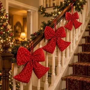 Set of three large red quilted Christmas bows with gold dot patterns for decor