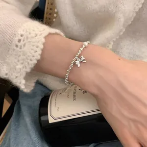 S925 sterling silver broken silver bead bracelet with elegant pearl and bow charm