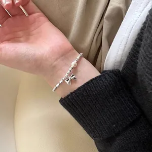 Elegant S925 sterling silver bead bracelet with pearl and bow pendant for women
