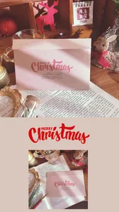 Festive pink Christmas greeting card with envelope and Santa Claus postmark